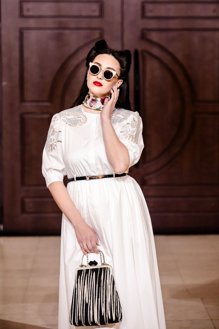 Look 05: White broderie dress, floral neck scarf, black-and-cream frame bag