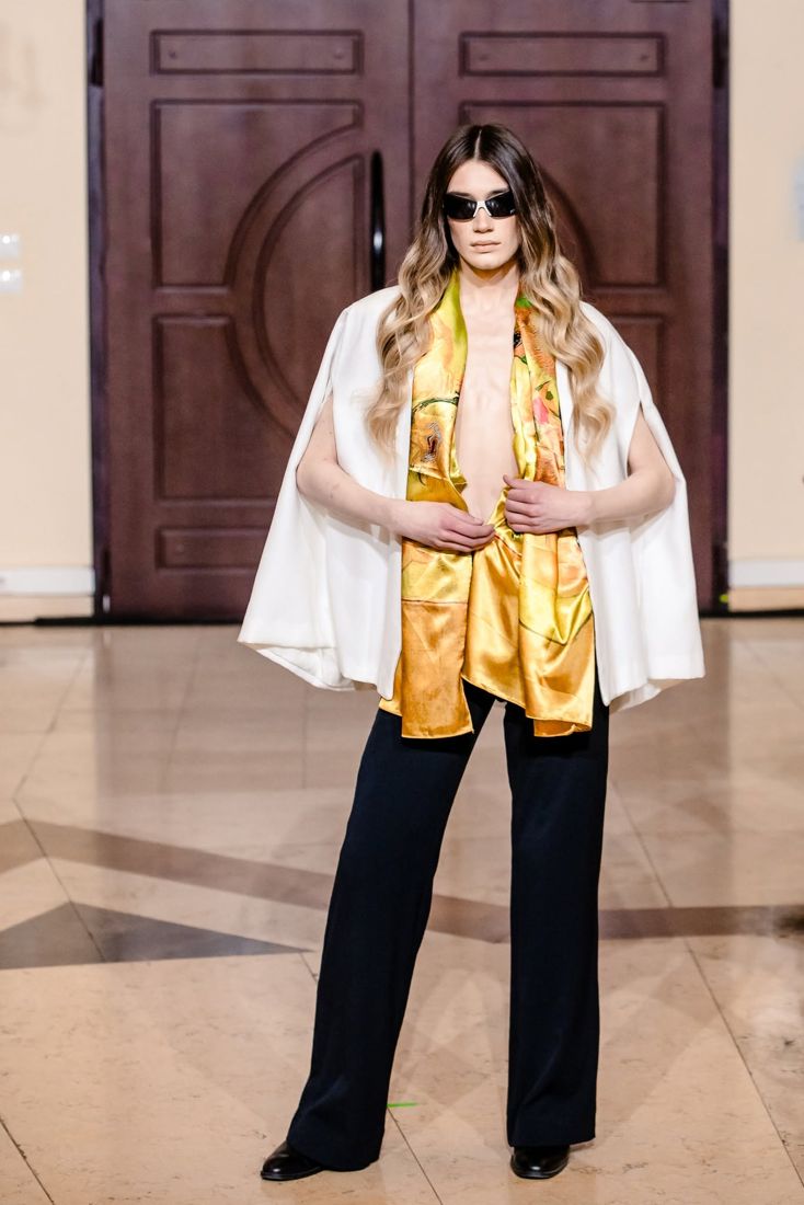 Look 10: White cape blazer, gold silk scarf, wide black trousers