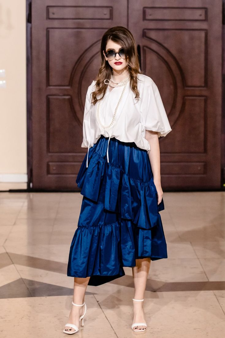 Look 11: White balloon blouse, pearls, tiered navy taffeta skirt