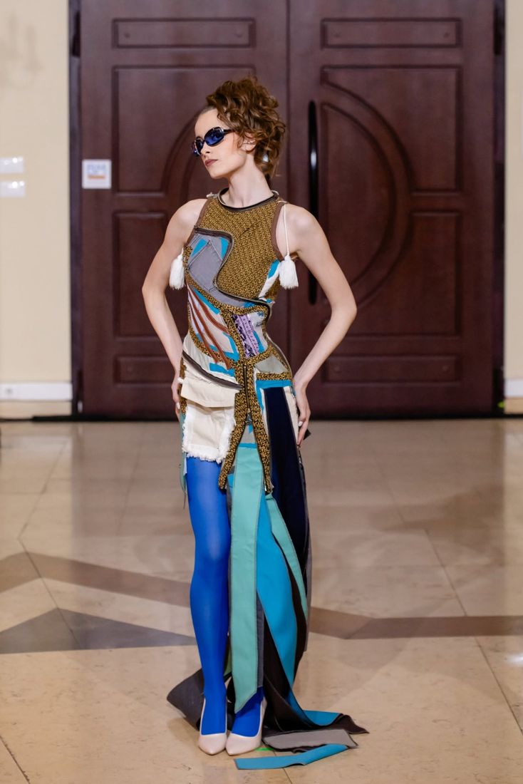 Look 18: Patchwork corset dress, cobalt tights, blue lenses